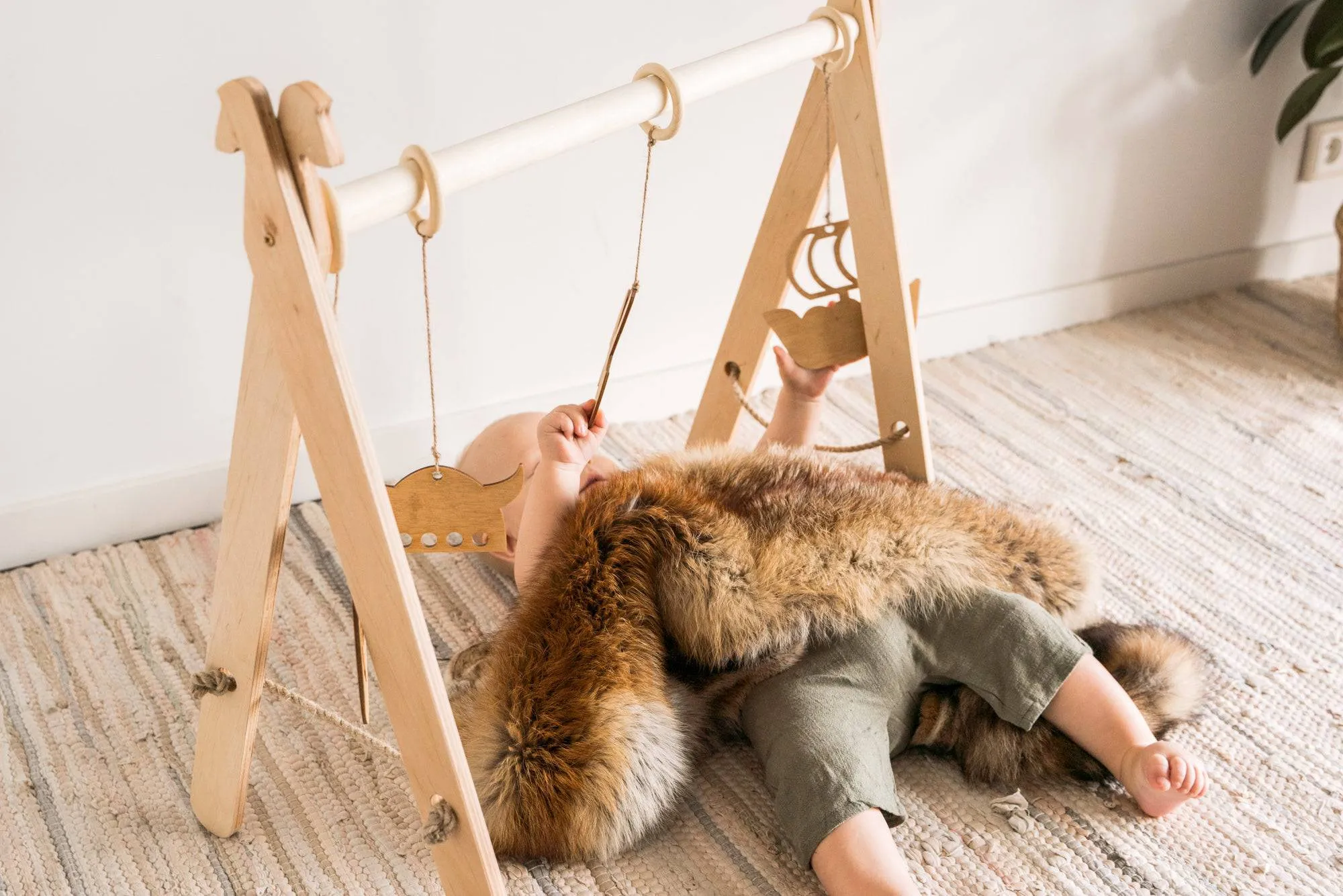 Wooden play gym for baby (Viking theme)